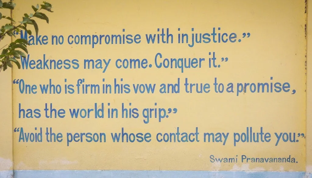 Quote of Swami Pranavananda written in English on Naogaon Sevashram Sangha wall