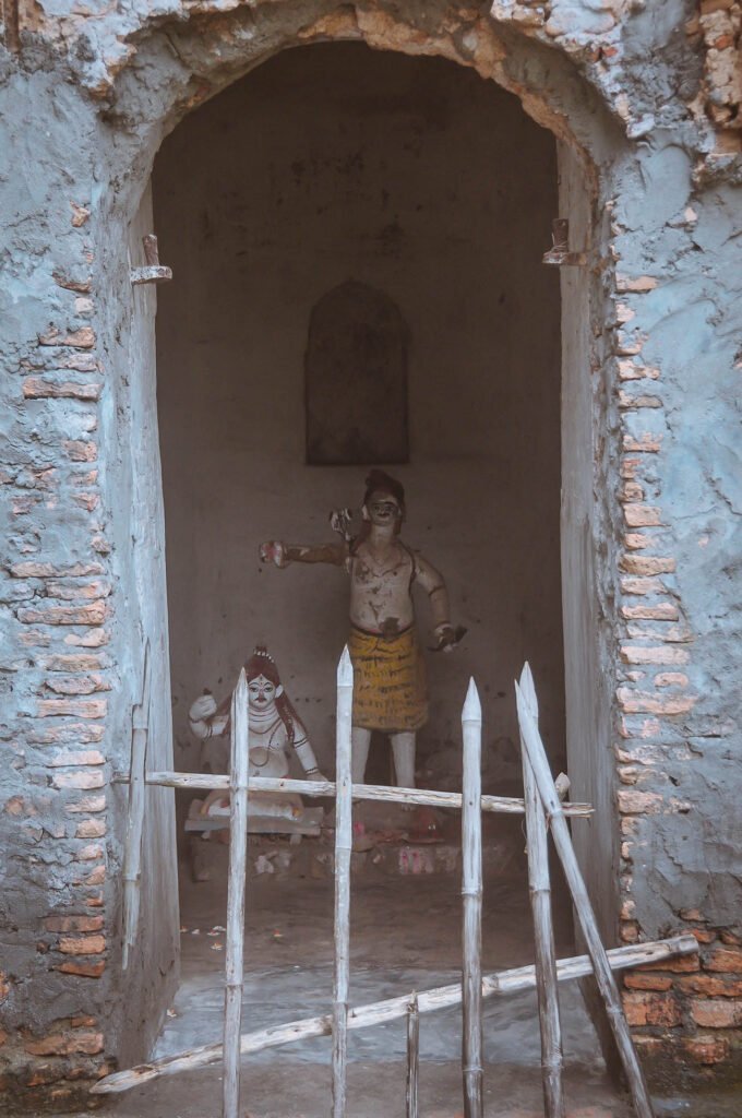 Two Deities in Rajrajeshwari Temple's Left Tower