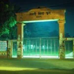 Midnight view of Naogaon Zilla School's main entrance, 2023.