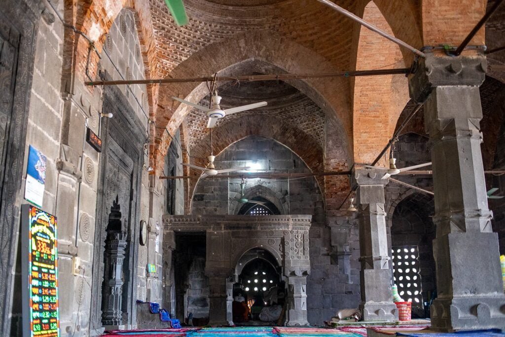 Interior of Kusumba Mosque, Naogaon, showcasing the North side view with a stone-made Mihrab, 2023.
