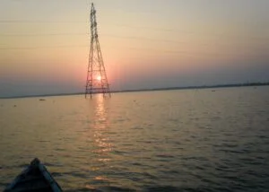 নওগাঁর দিঘলী (তাল তলী) বিলের সূর্যাস্তের দৃশ্য।