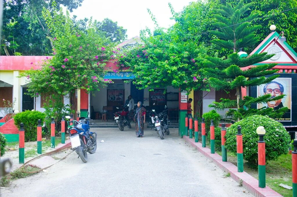 Chandipur Union Parishad office is a village like quiet among the leafy trees and bright flowers of Naogaon Sadar Upazila.