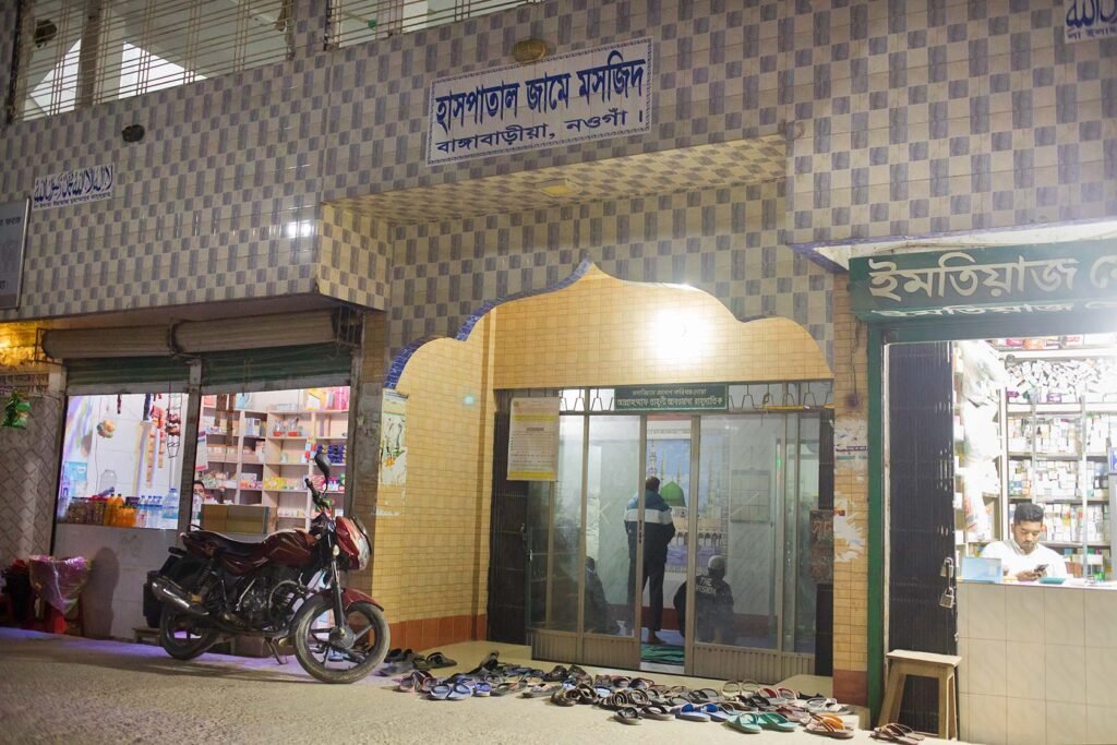 A nighttime image of the Hospital Jame Mosque located in Bangabaria, Naogaon.