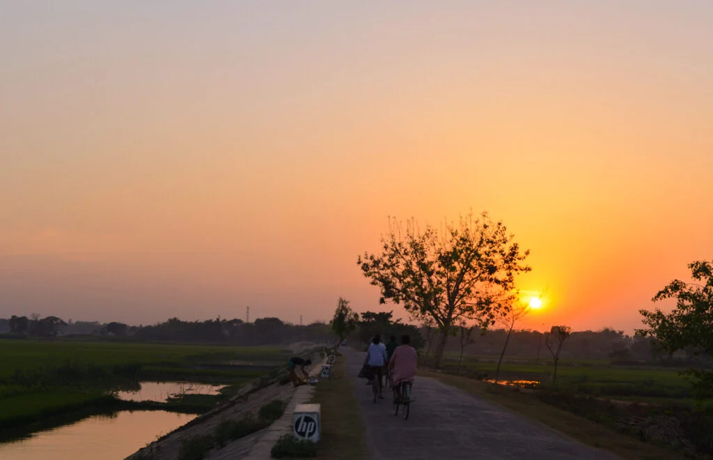 Sunset scene on Taltoli Road, Naogaon, captured in 2013.