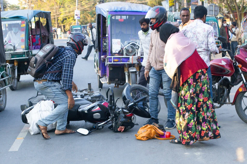 Bike collision incident near Judge Court on the main road.