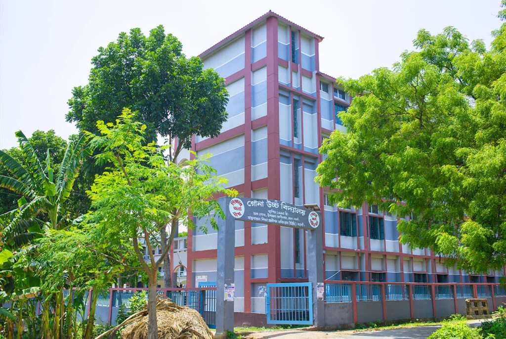 Beautiful scene of Gona High School surrounded by greenery in Raninagar Upazila, captured in 2023 AD.