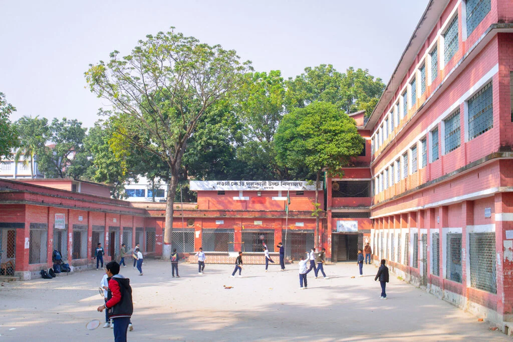 Inside view of Naogaon Krishnadhan (K.D.) Govt. High School, a boys-only educational institution.