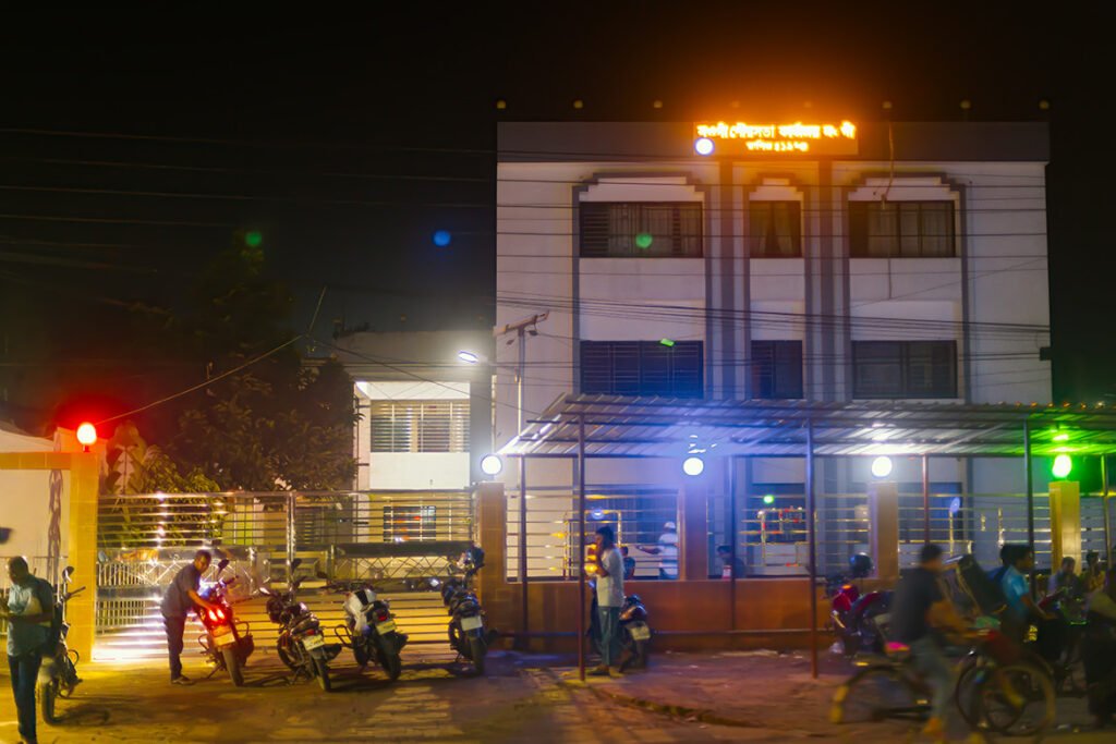 Naogaon Pourashava municipal complex at night – 2025.