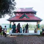 South-side ghat of historic Dibar Dighi in Patnitala Upazila, Naogaon.